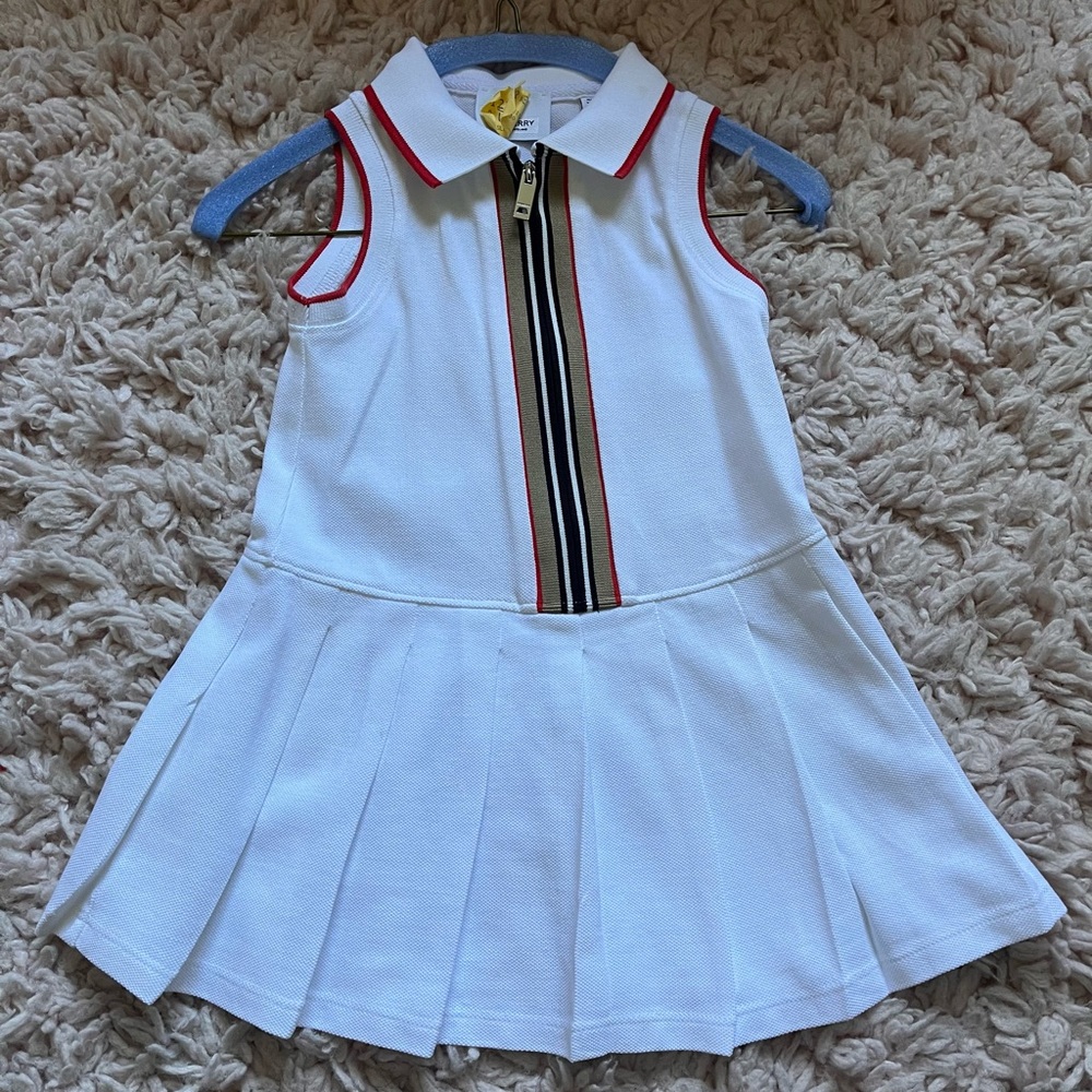 Burberry Dress
Icon Stripe Detail Cotton Zip-front Polo Dress
